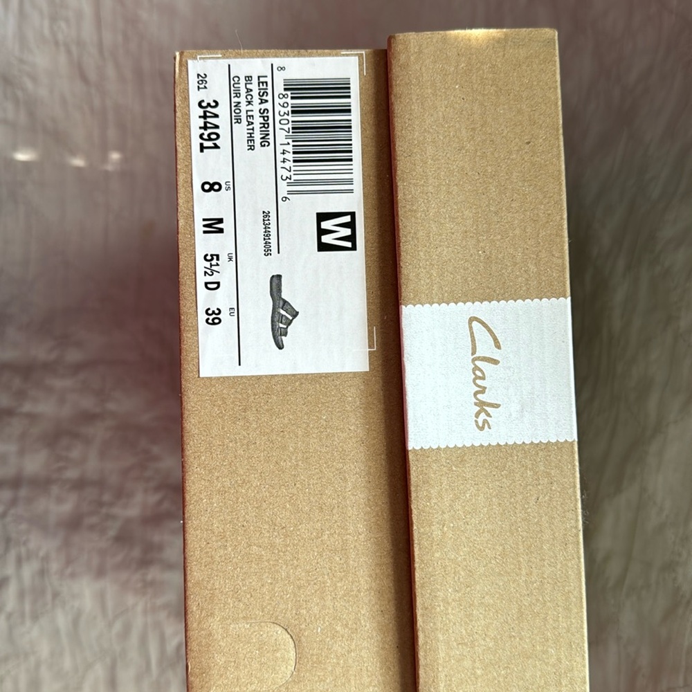 Black Collections by Clark’s sandals. New I box, never worn